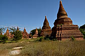 The cluster of red brick temples, named Khay-min-gha on the map on the North plain of Bagan. Myanmar. 